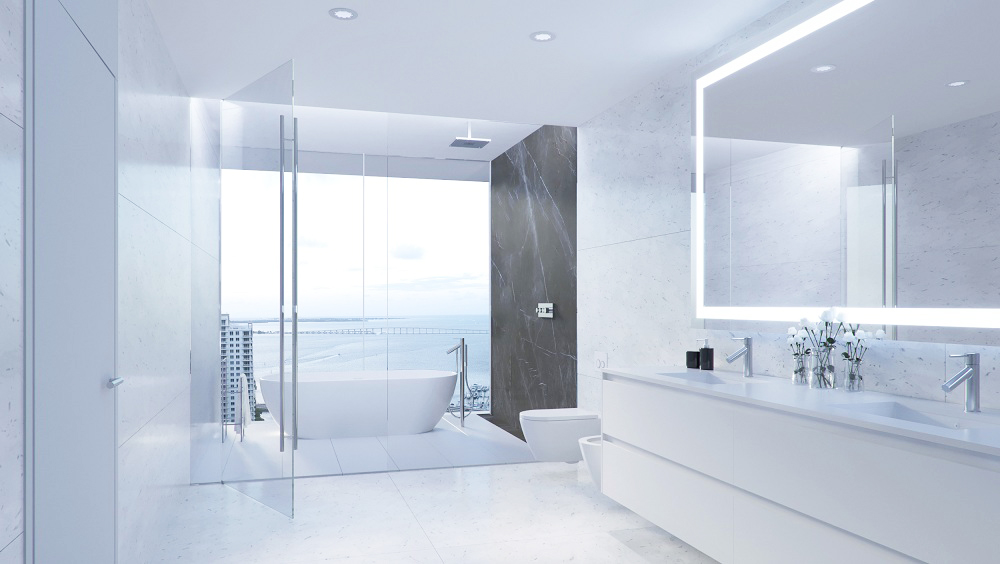 Marble master bathroom with freestanding tub and bay views